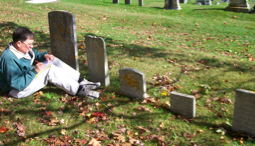 Researching grave stones in Seaside Cemetery